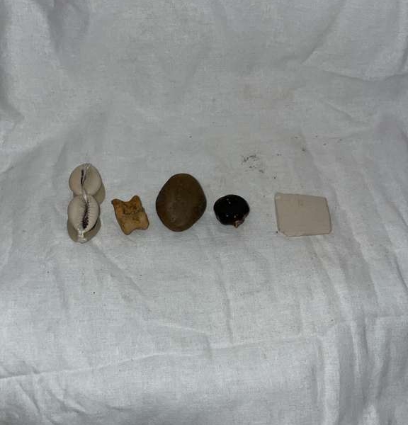Igbo divination casting set with cowrie shells and sacred elements
